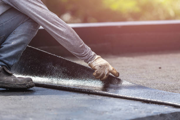 Professional Emergency Waterproofing technician working in Fellsburg, PA